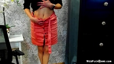 German MILF posing in mini skirt on webcam