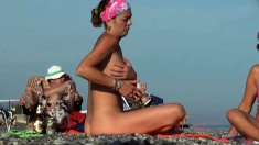 Amateur video of Couple at a public beach nude
