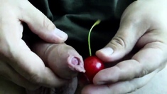 Uncut cock cumming twice on a cherry
