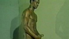 Muscled black man shows off his sexy body and jerks himself off